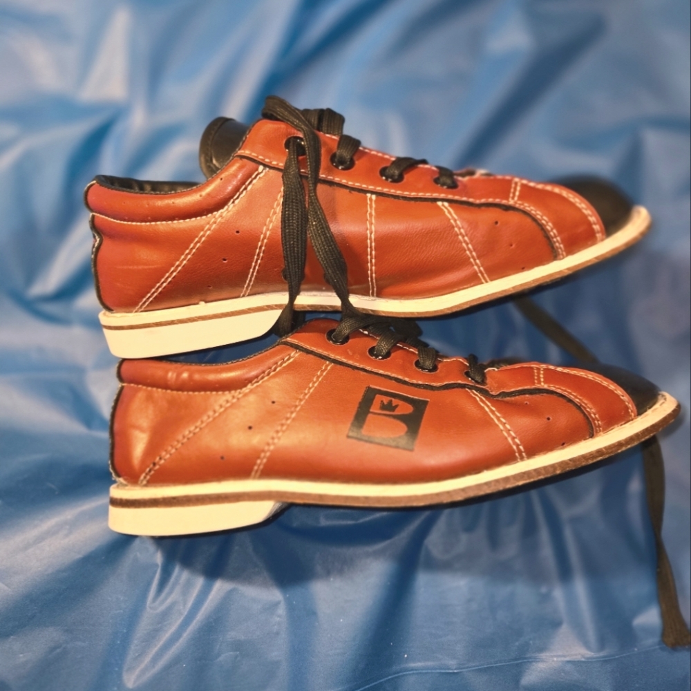 Brunswick bowling shoes.  Red/ Black Men's Size 5. Women's Size 7.